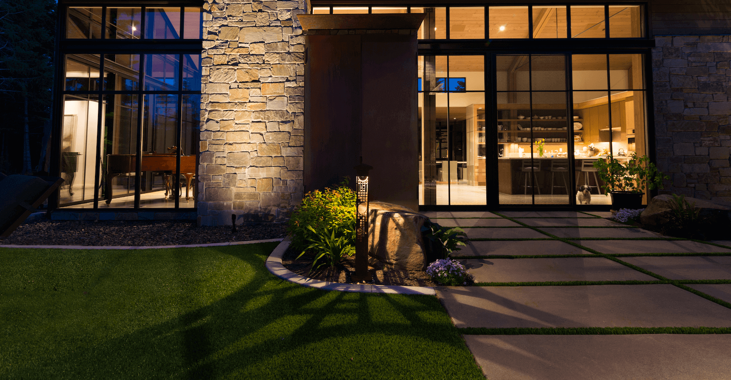 Outdoor lights showcase a Suncadia Home in Cle Elum, WA originally designed by Olson Kundig.