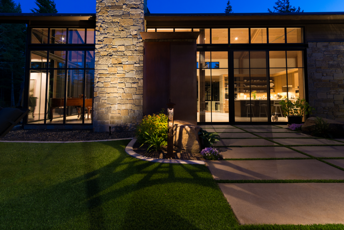 Outdoor lights showcase a Suncadia Home in Cle Elum, WA originally designed by Olson Kundig.