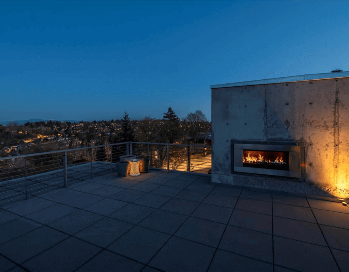 Capitol Hill Tri-Level Residence- Veranda with fire place