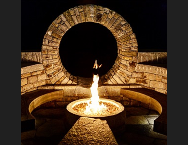 Moongate-fireplace with circle design stone