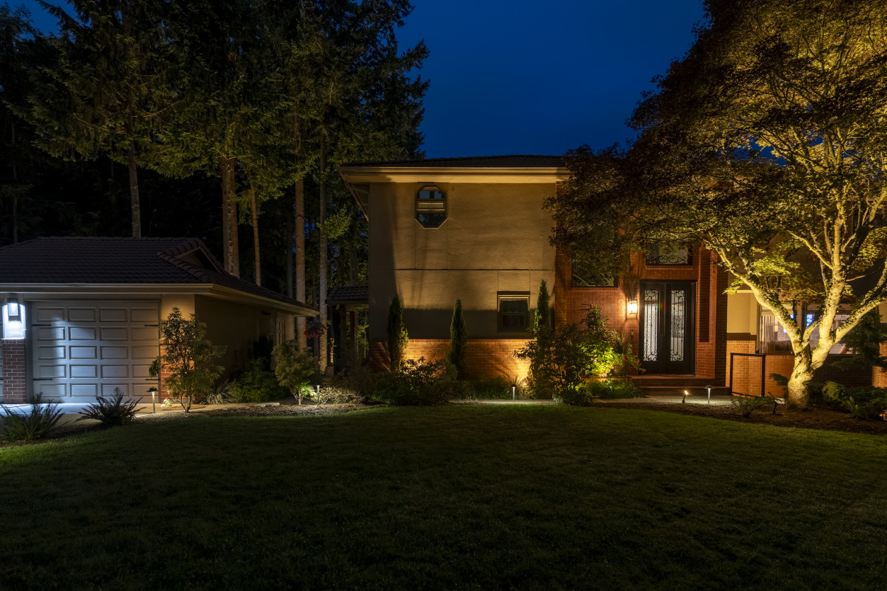 Architectural and landscape lighting accenting entry garden and façade at the Wind & Tide Hillside Estate in Edmonds, WA.